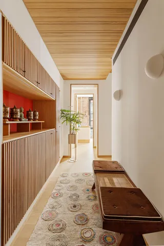 a view of a dining room with furniture and window