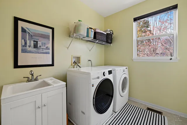 a utility room with dryer and washer