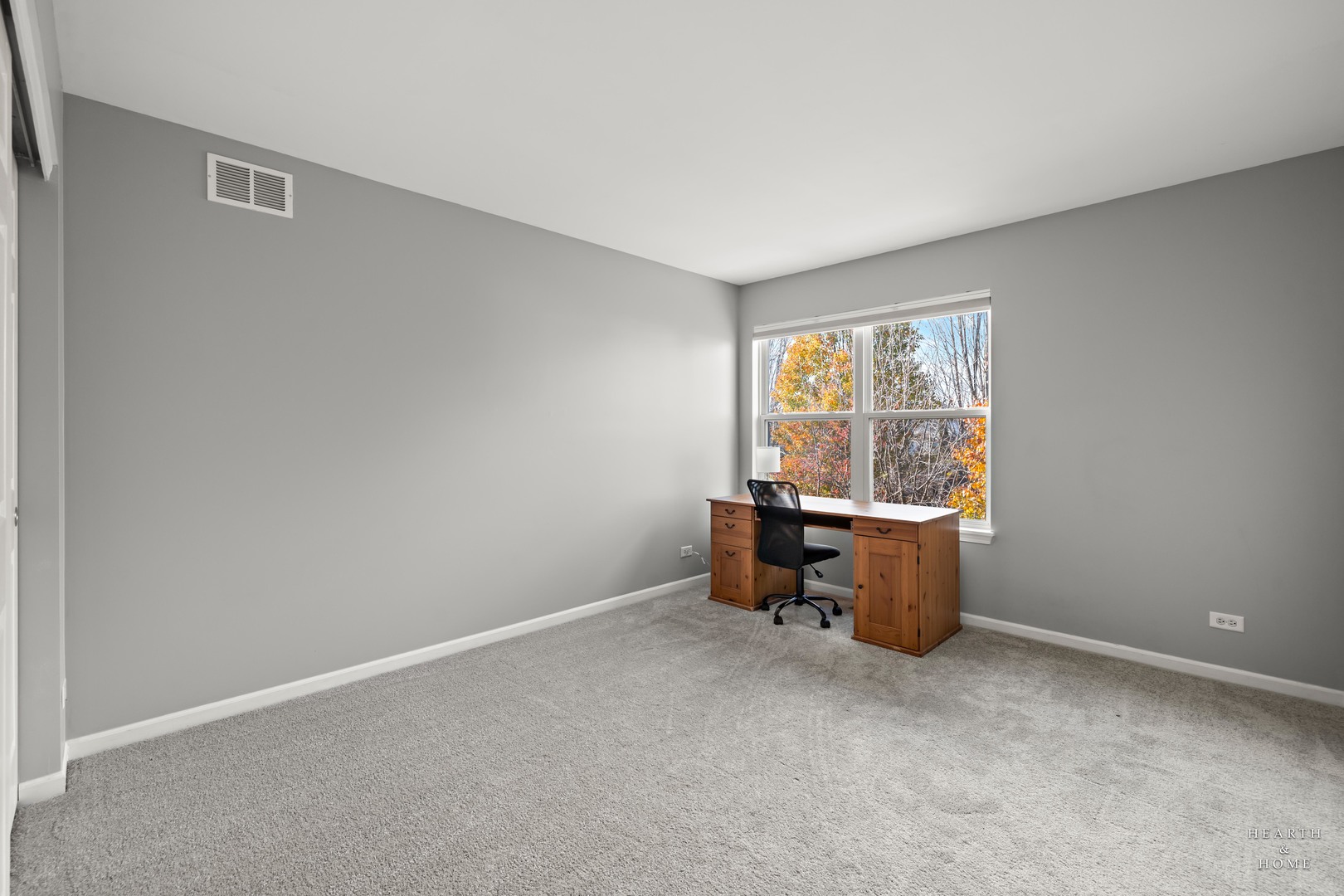 11561 Beacon Avenue Huntley, IL 60142 - Photo 23 of 35 a view of an empty room with a window
