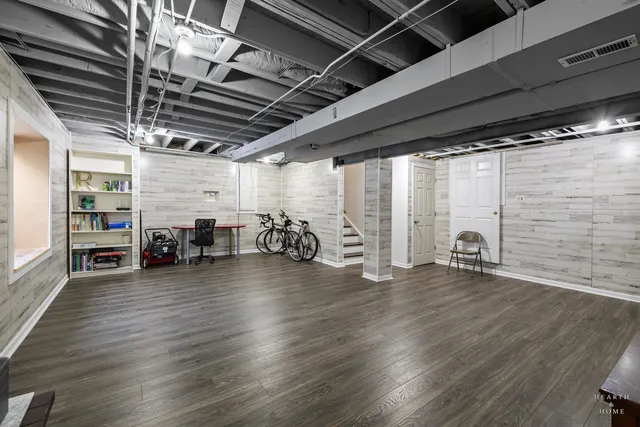 a house view with swimming pool in front of it