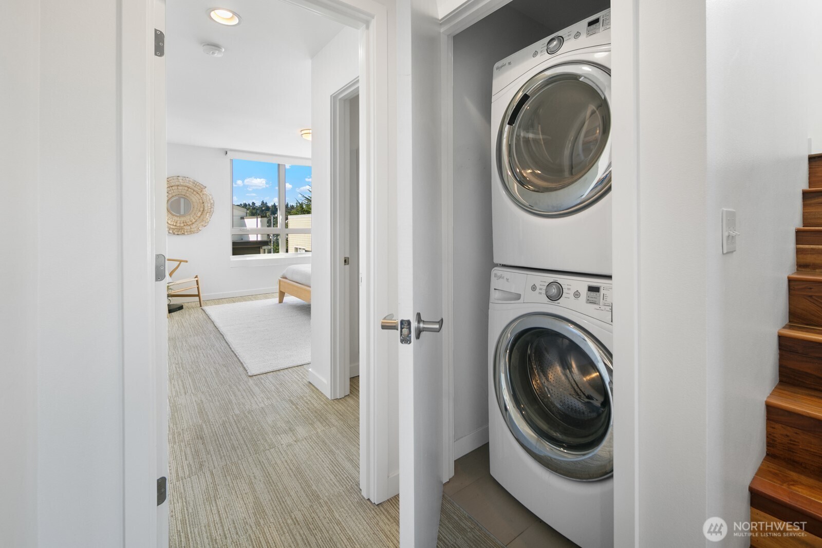 2808 14th Avenue West, Unit B Seattle, WA 98119 - Photo 21 of 39 a view of a hallway with washer and dryer