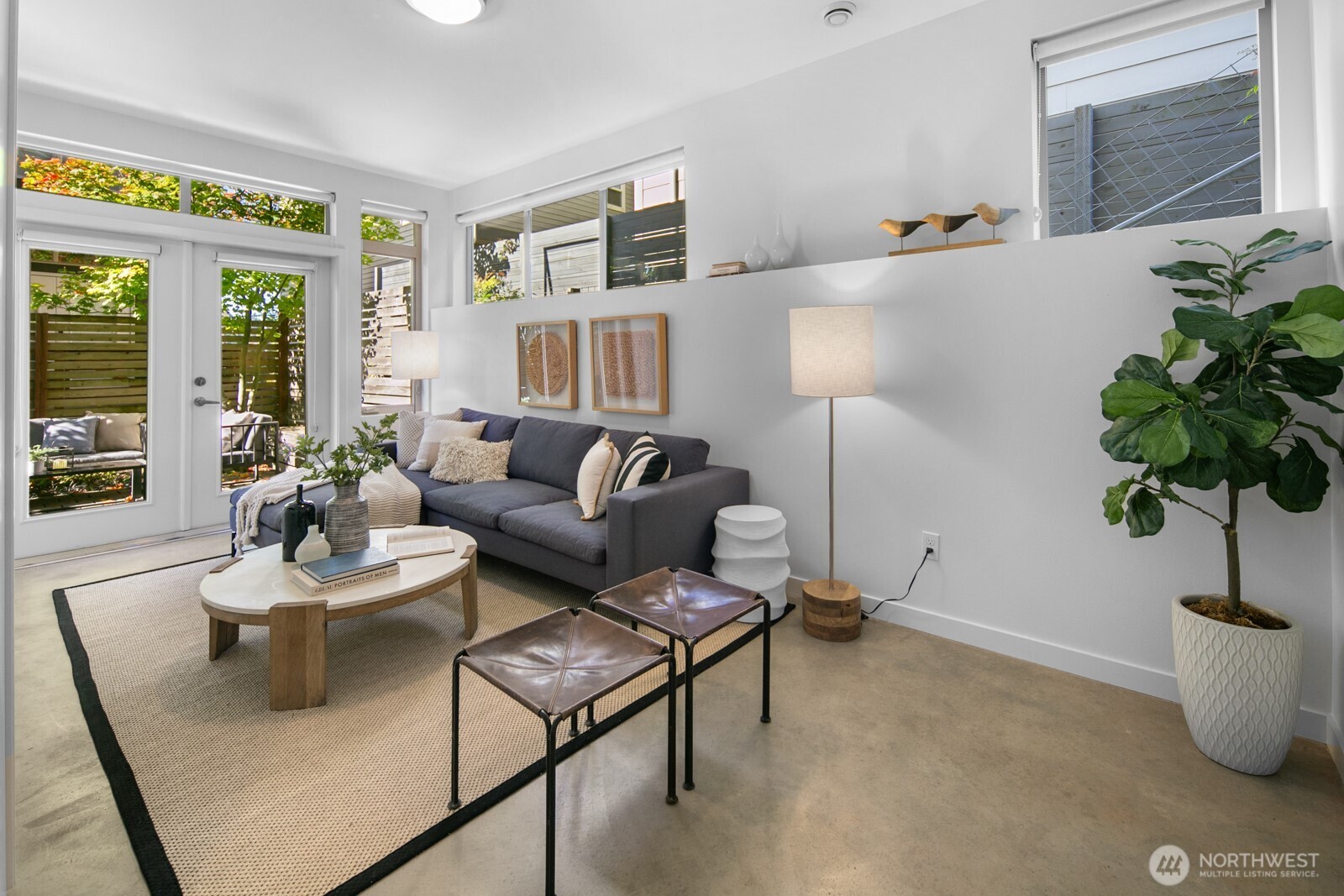 2808 14th Avenue West, Unit B Seattle, WA 98119 - Photo 22 of 39 a living room with furniture and a potted plant