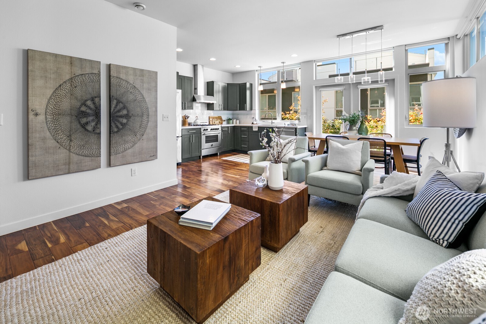 2808 14th Avenue West, Unit B Seattle, WA 98119 - Photo 3 of 39 a living room with furniture and a large window