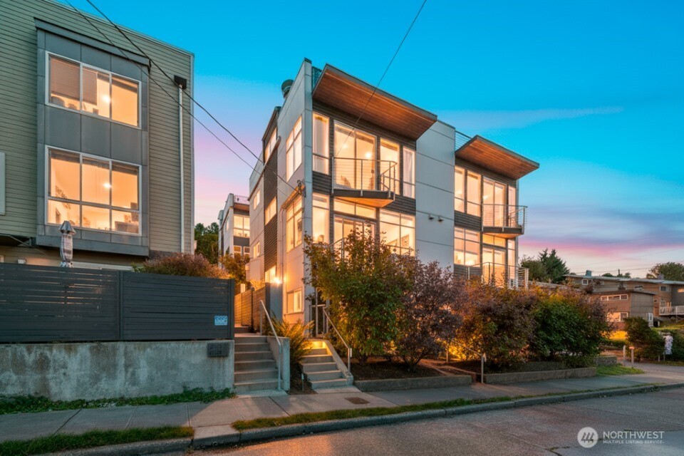 2808 14th Avenue West, Unit B Seattle, WA 98119 - Photo 39 of 39 a front view of a house with a yard