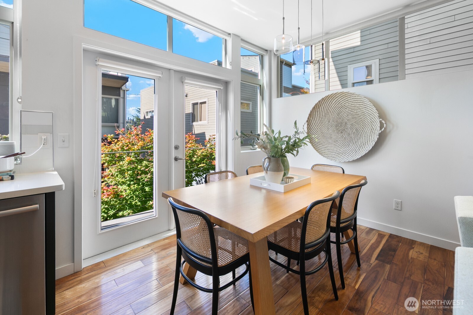 2808 14th Avenue West, Unit B Seattle, WA 98119 - Photo 8 of 39 a view of a dining room with furniture and wooden floor