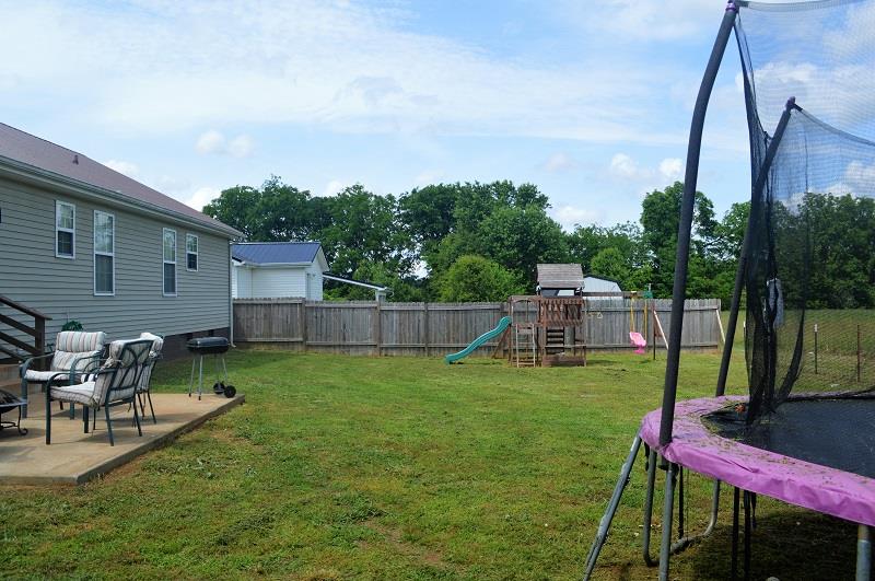 188 Modena Circle Decherd, TN 37324 - Photo 20 of 23 Privacy fence on 2 sides for privacy from your neighbors.