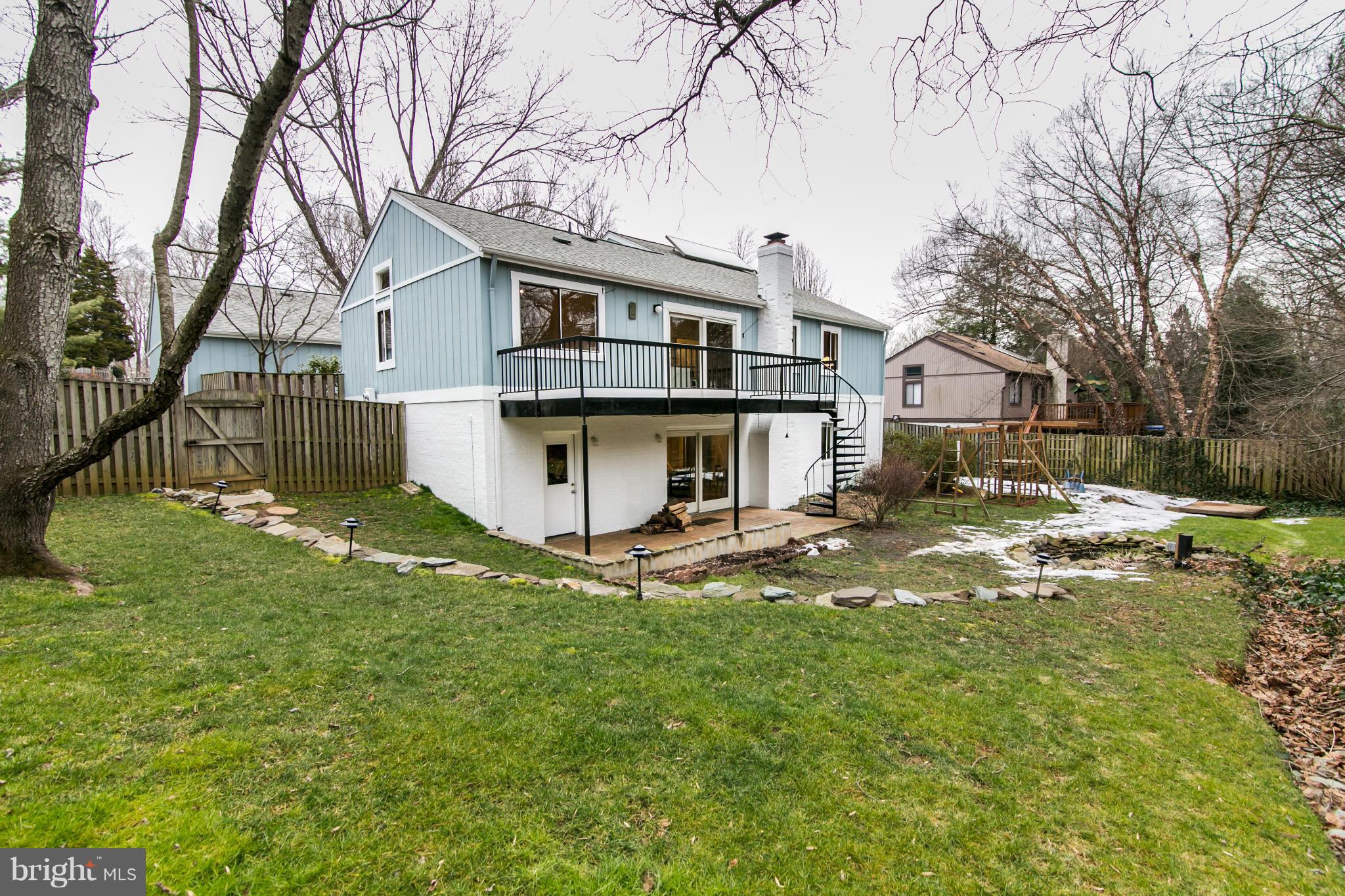 11821 Blue Spruce Road Reston, VA 20191 - Photo 27 of 28 a view of house with yard and a large tree
