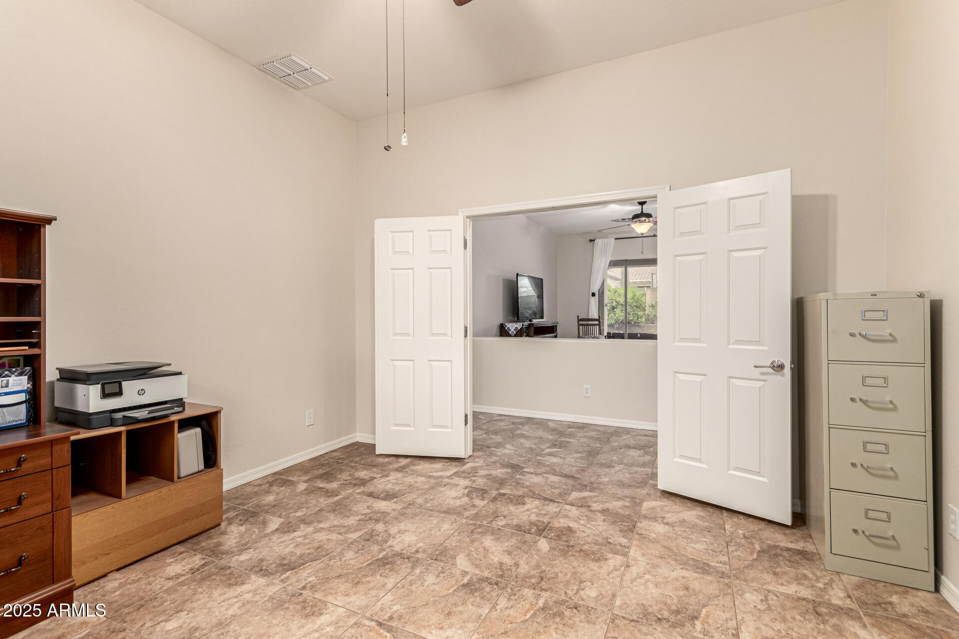 4808 West Cavalry Road Phoenix, AZ 85087 - Photo 27 of 67 a view of a kitchen with refrigerator and an oven