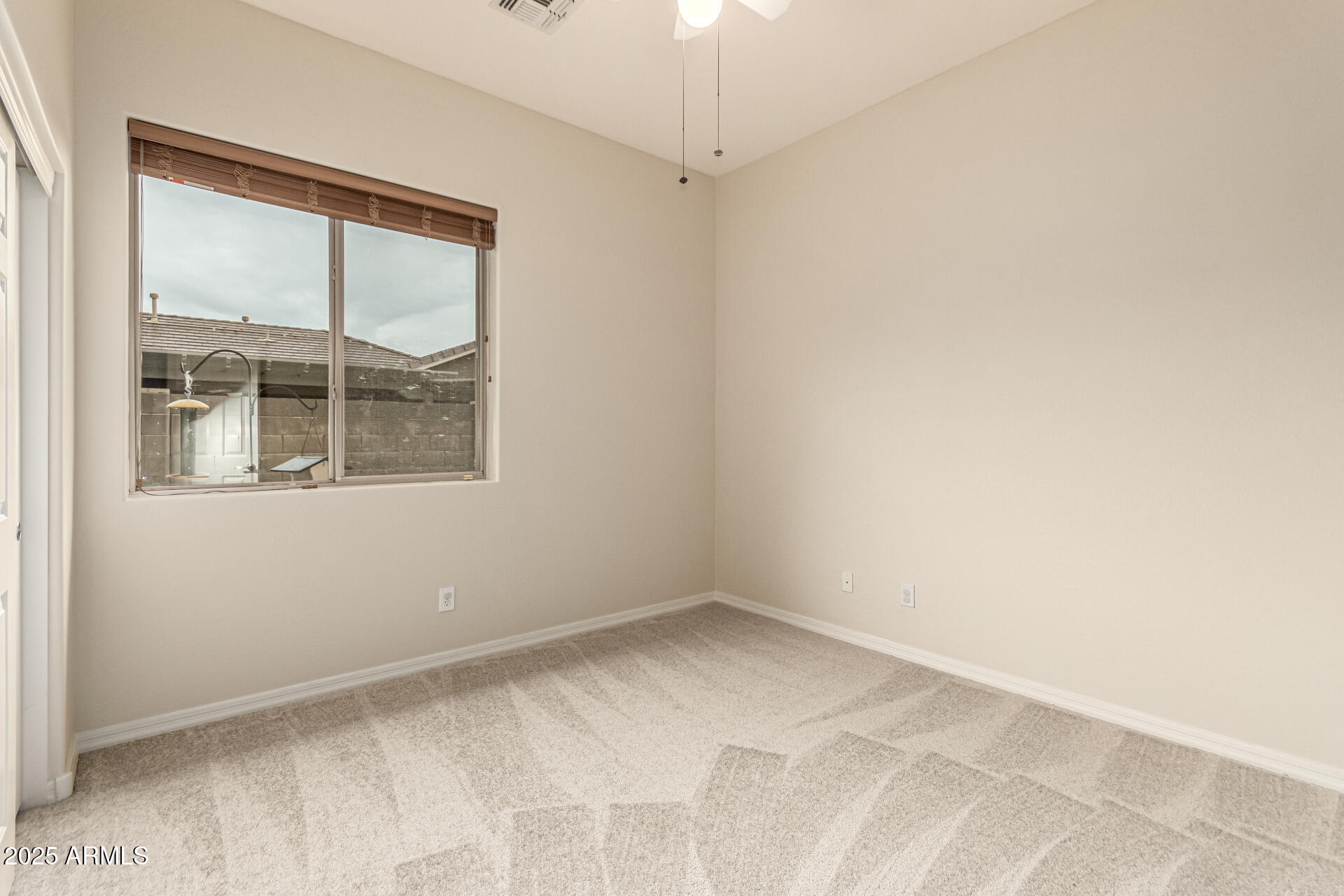 4808 West Cavalry Road Phoenix, AZ 85087 - Photo 33 of 67 a view of empty room with window