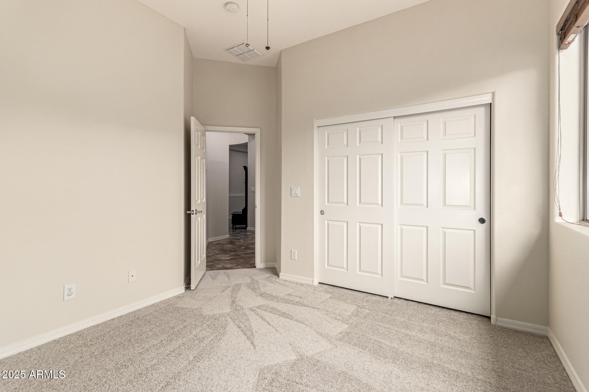 4808 West Cavalry Road Phoenix, AZ 85087 - Photo 34 of 67 an empty room with a bathroom and a shower