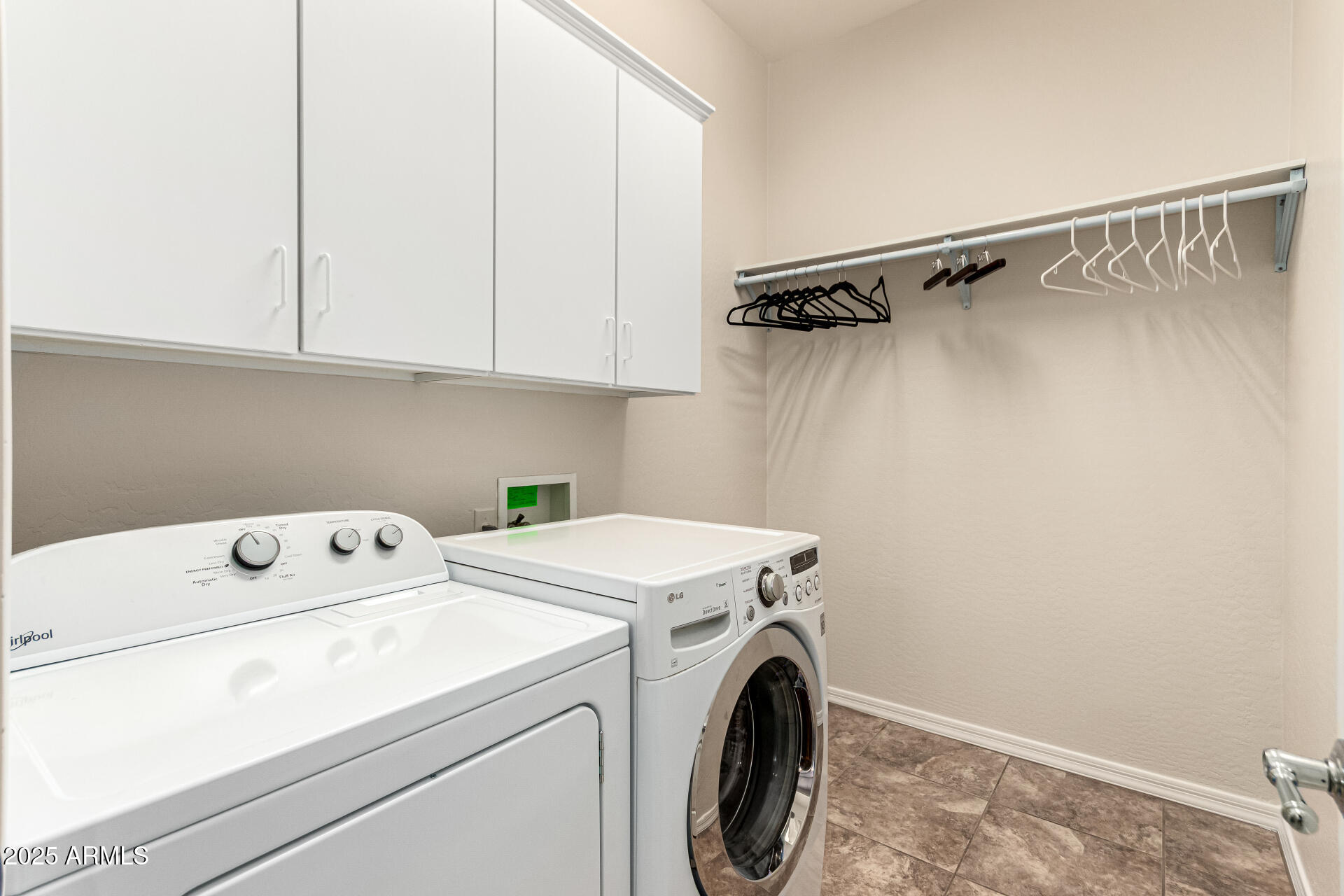4808 West Cavalry Road Phoenix, AZ 85087 - Photo 36 of 67 a utility room with dryer and washer
