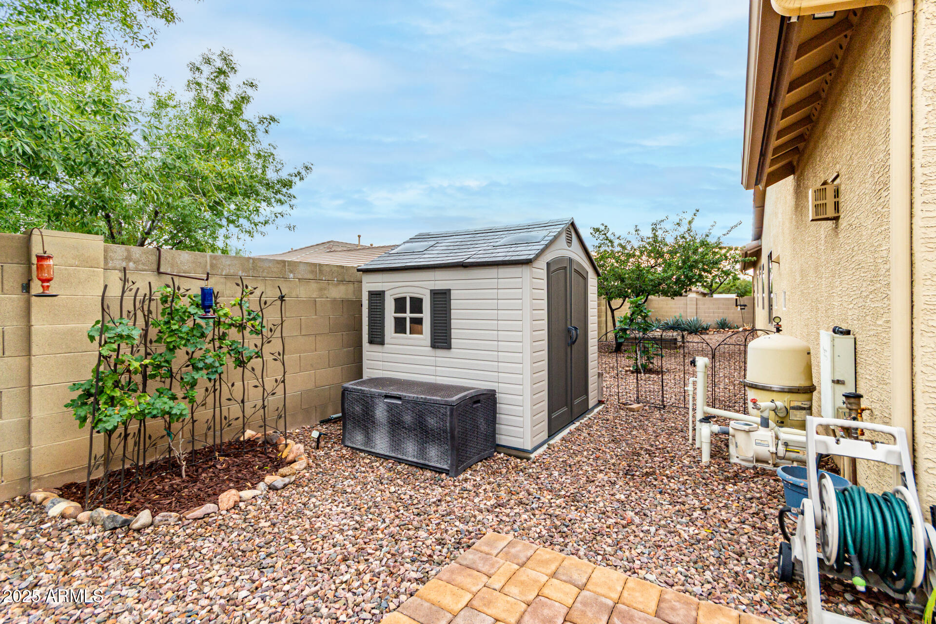 4808 West Cavalry Road Phoenix, AZ 85087 - Photo 46 of 67 a view of a backyard with sitting area