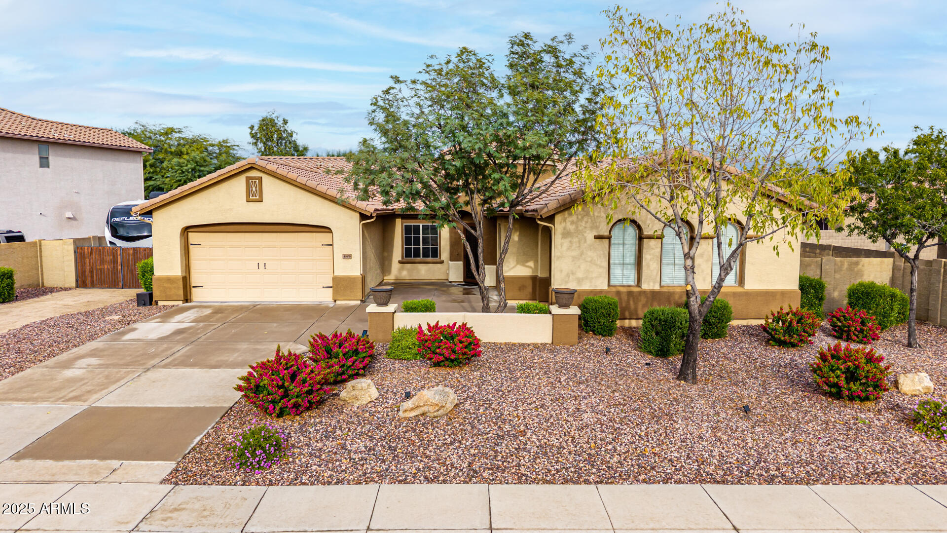 4808 West Cavalry Road Phoenix, AZ 85087 - Photo 52 of 67 a front view of a house with a yard