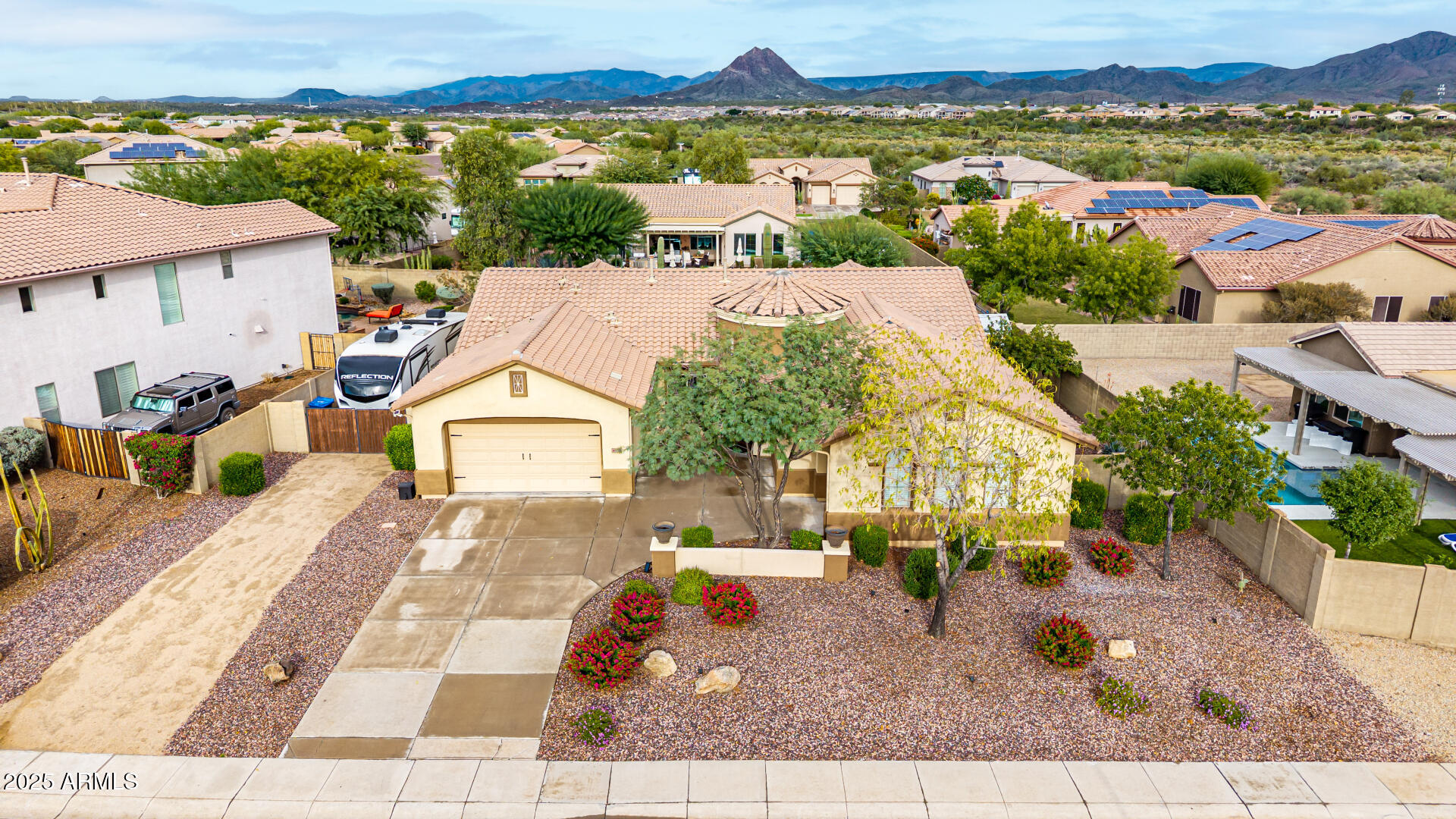 4808 West Cavalry Road Phoenix, AZ 85087 - Photo 54 of 67 an aerial view of residential houses with outdoor space and parking