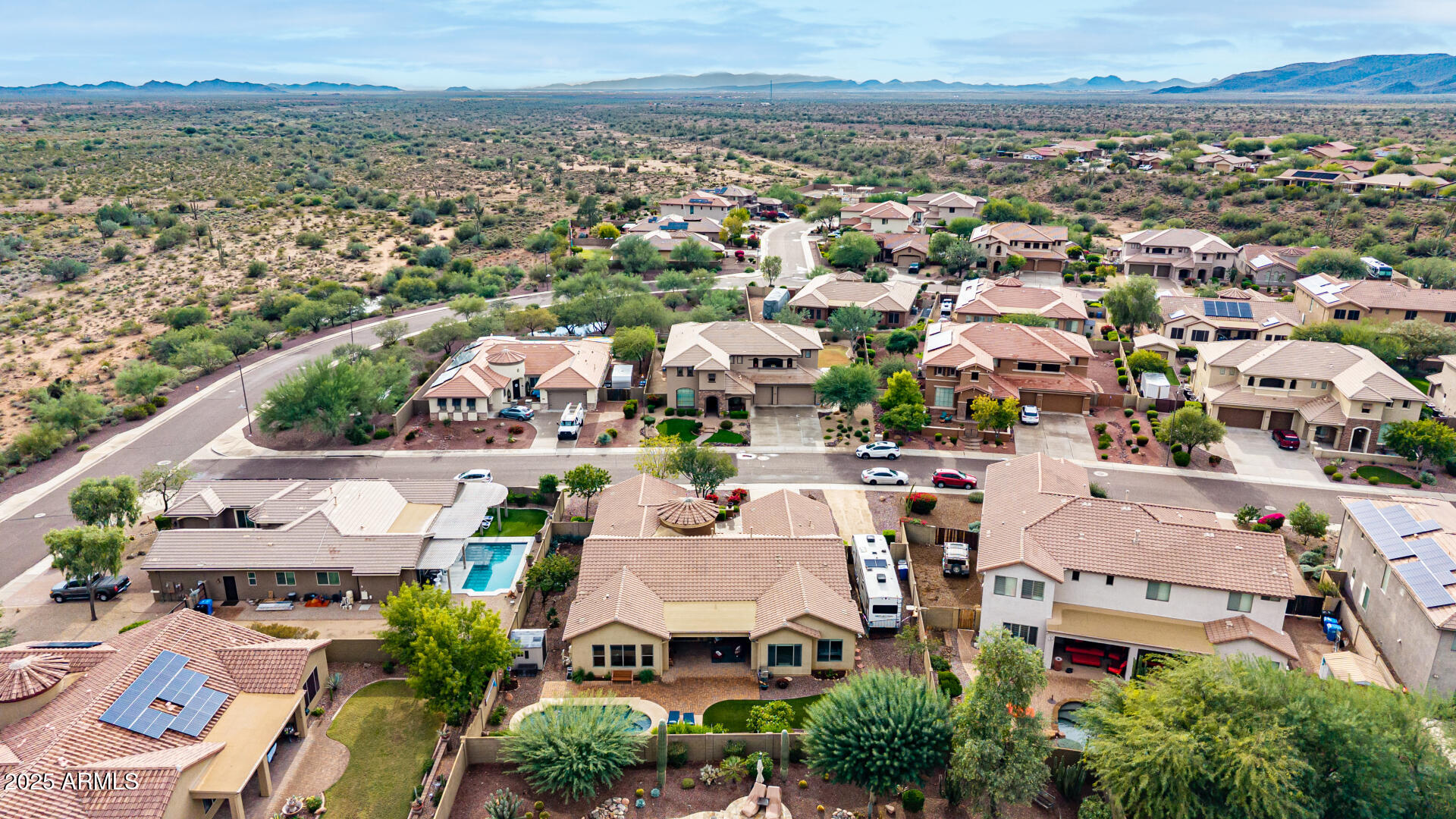 4808 West Cavalry Road Phoenix, AZ 85087 - Photo 59 of 67 an aerial view of residential houses with outdoor space