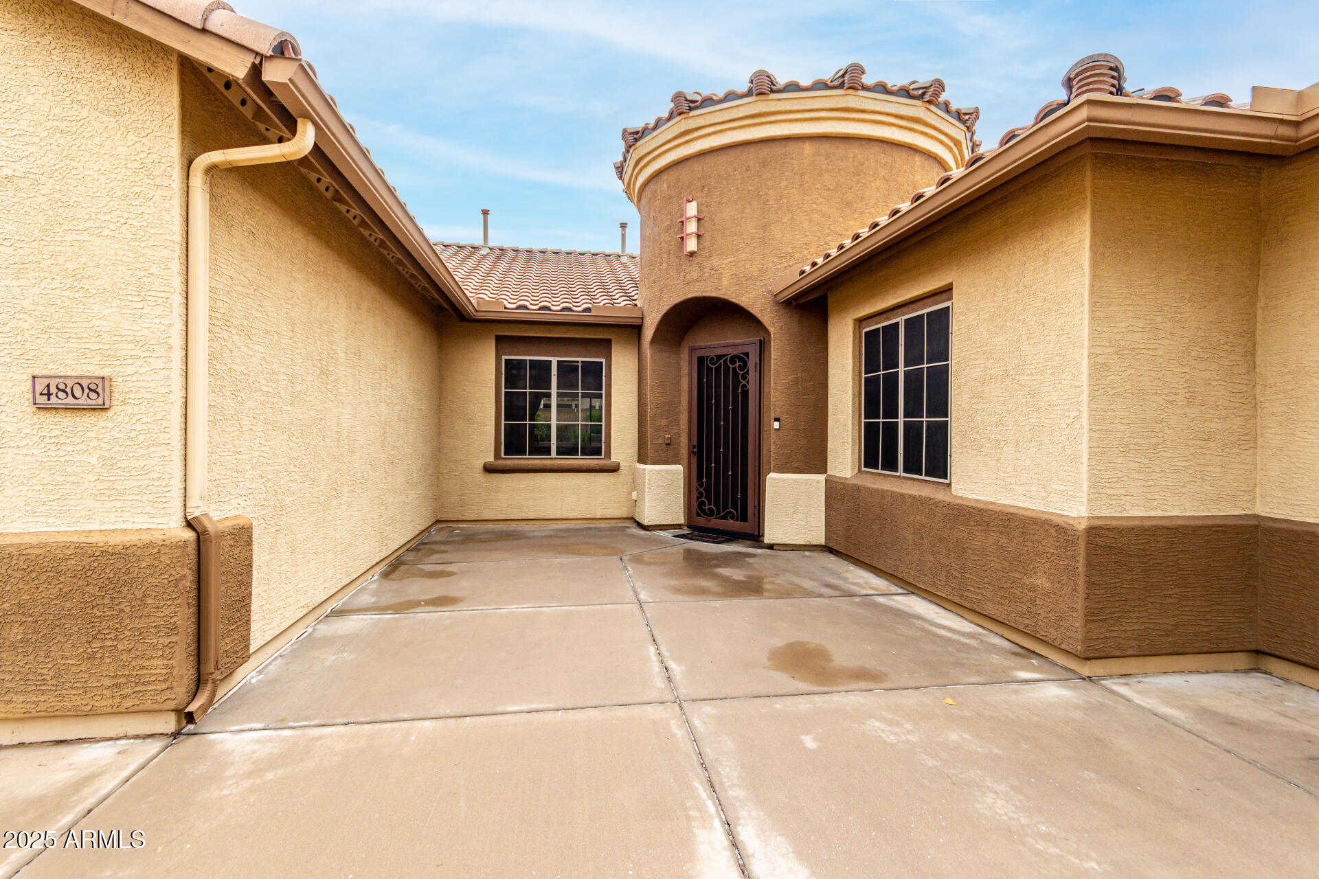 4808 West Cavalry Road Phoenix, AZ 85087 - Photo 64 of 67 a front view of a house with a garage