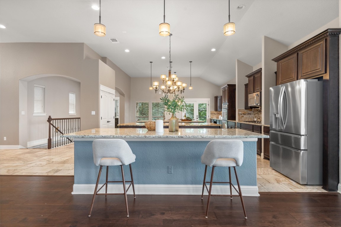 2504 Highland Trail Leander, TX 78641 - Photo 1 of 1 a kitchen with refrigerator and cabinets