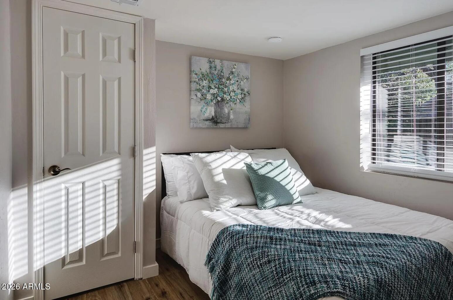 209 West Estate Lane Payson, AZ 85541 - Photo 6 of 11 a bedroom with a large bed and a window