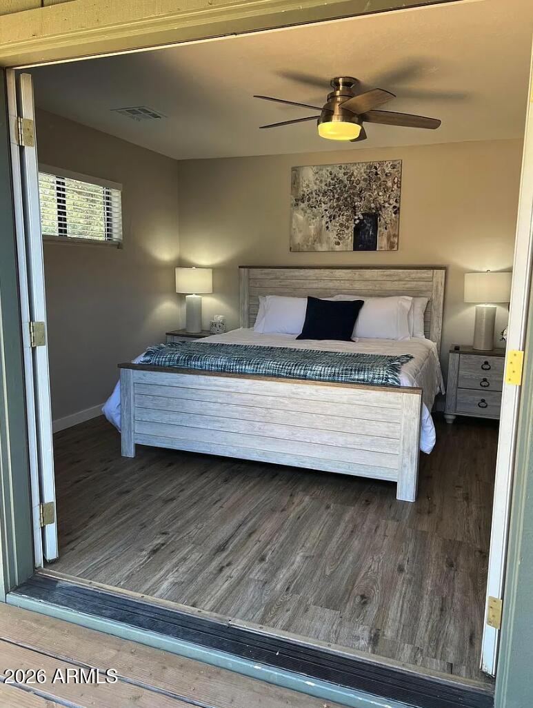 209 West Estate Lane Payson, AZ 85541 - Photo 7 of 11 a bedroom with a bed and a window