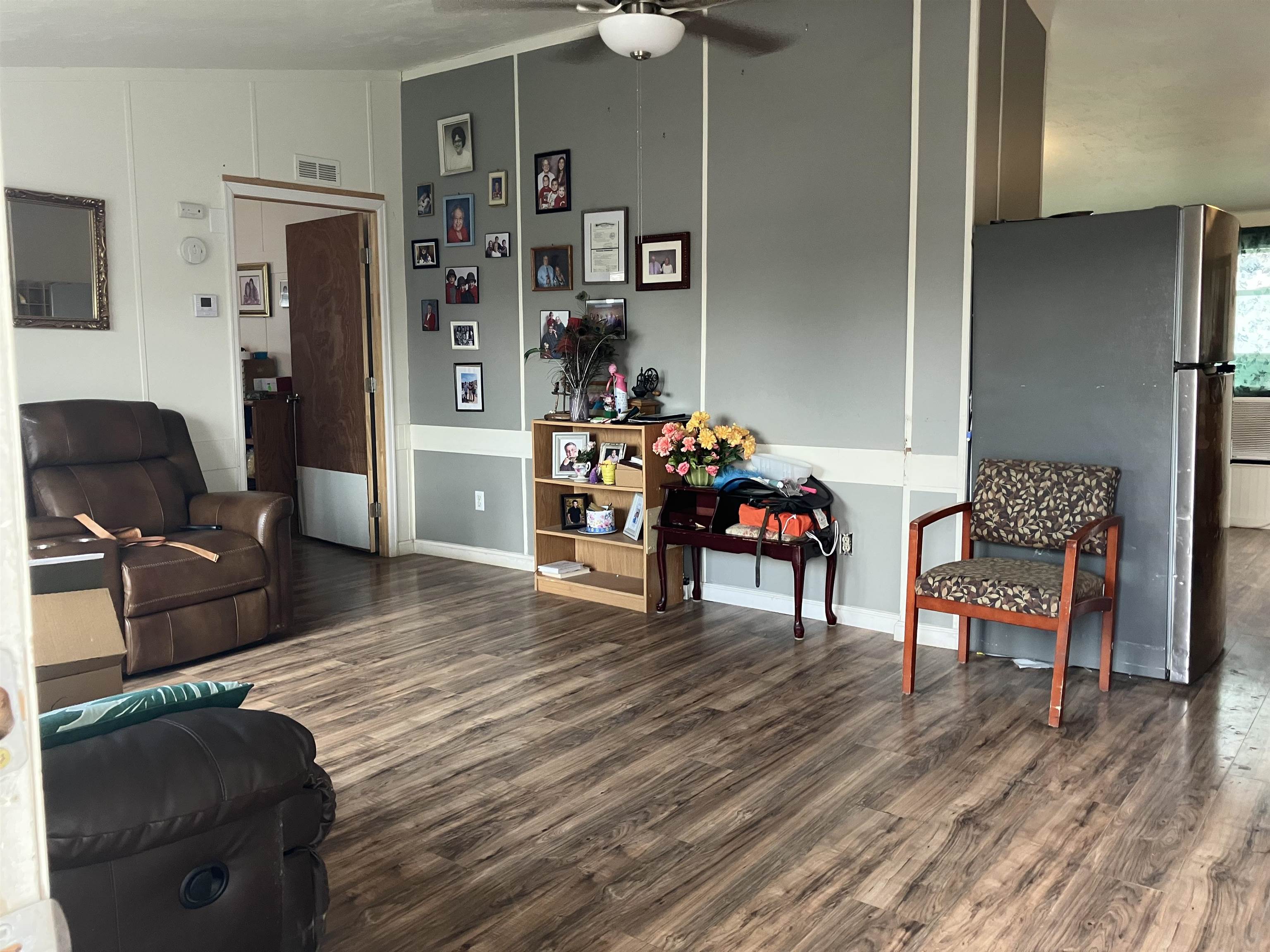 424 32 Road, Unit 388 Clifton, CO 81520 - Photo 11 of 16 a living room with furniture and wooden floor