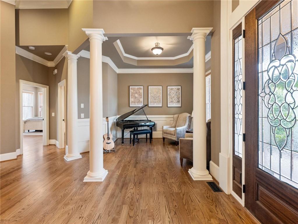 6147 Golf View Court Jefferson, GA 30549 - Photo 7 of 73 a living room with furniture and a wooden floor