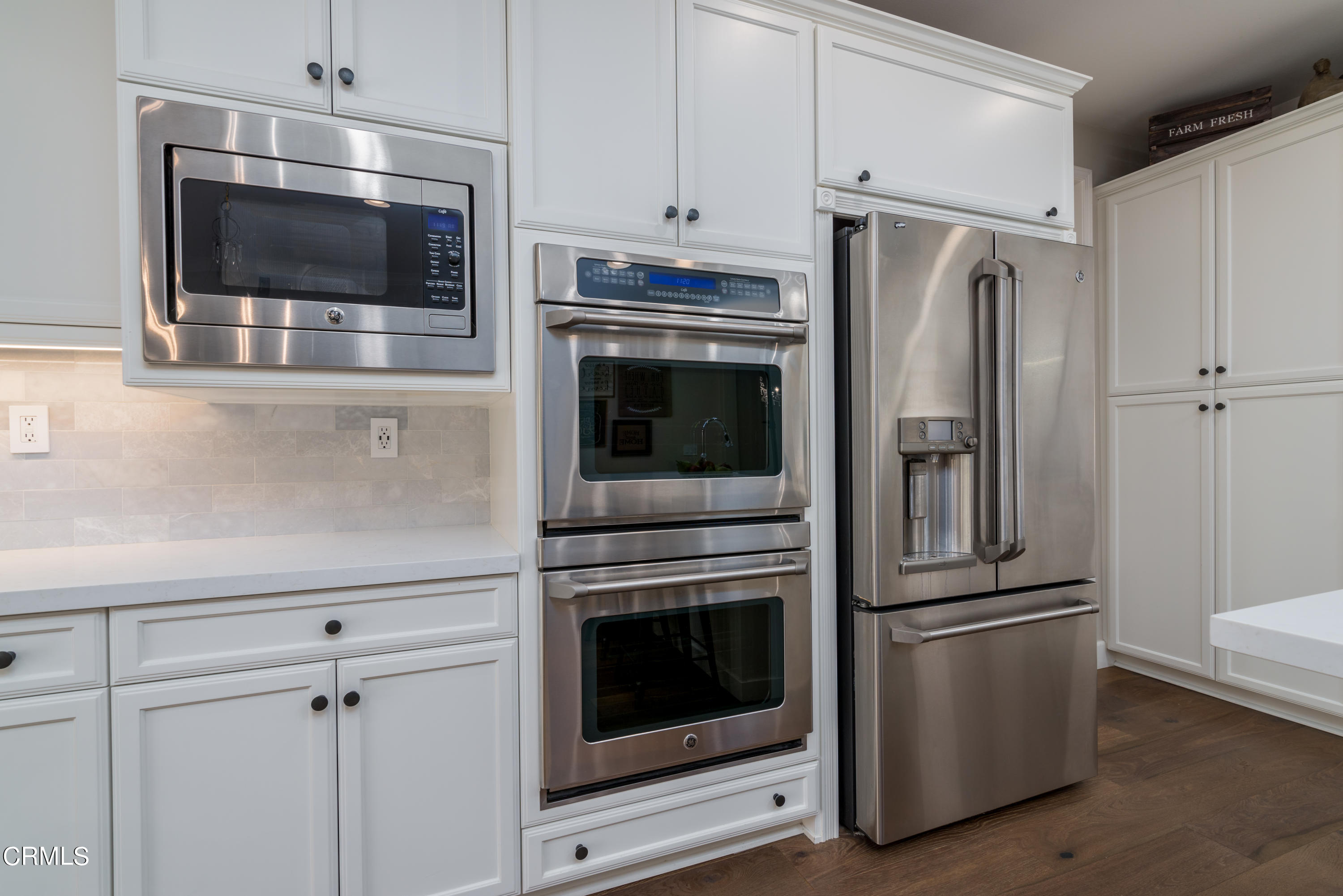 3064 White Rock Road Camarillo, CA 93012 - Photo 9 of 47 a kitchen with a refrigerator stove and microwave