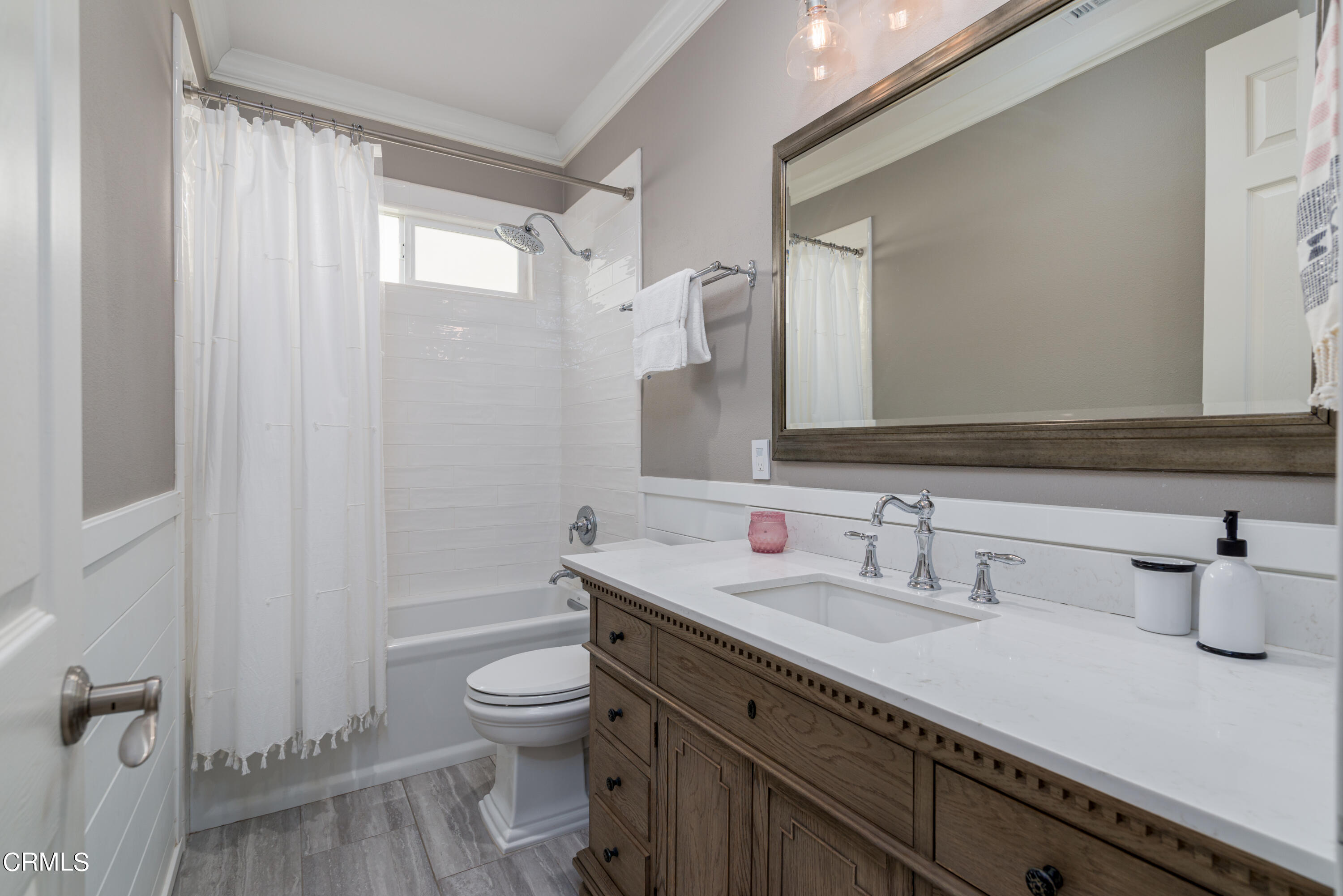 3064 White Rock Road Camarillo, CA 93012 - Photo 23 of 47 a bathroom with a toilet a sink and mirror