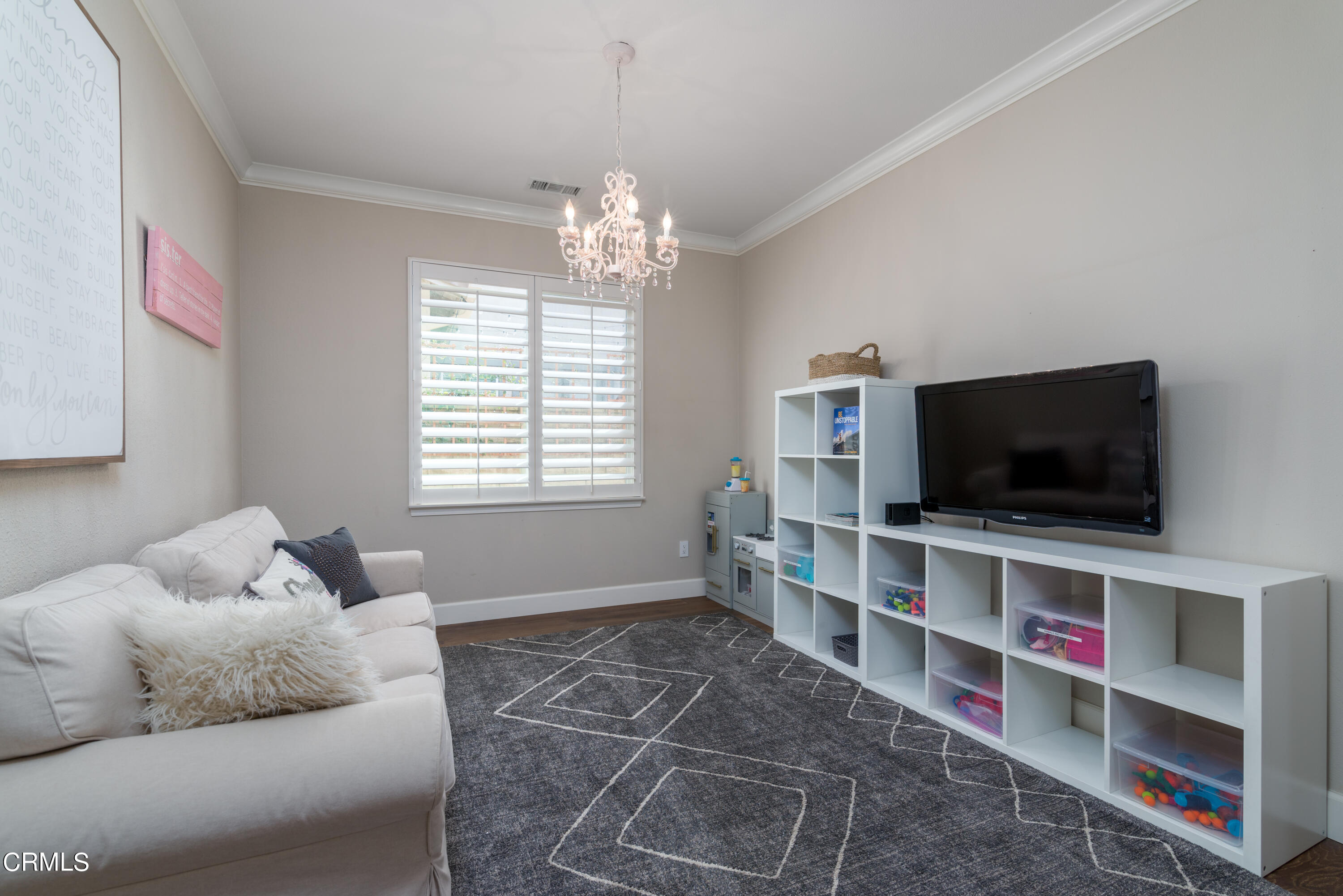 3064 White Rock Road Camarillo, CA 93012 - Photo 7 of 47 a living room with a flat screen tv and a window