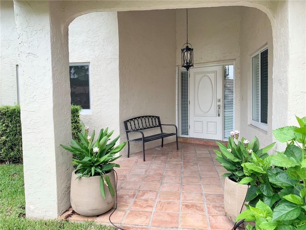 23336 Water Circle Boca Raton, FL 33486 - Photo 3 of 50 a view of a entryway door of the house