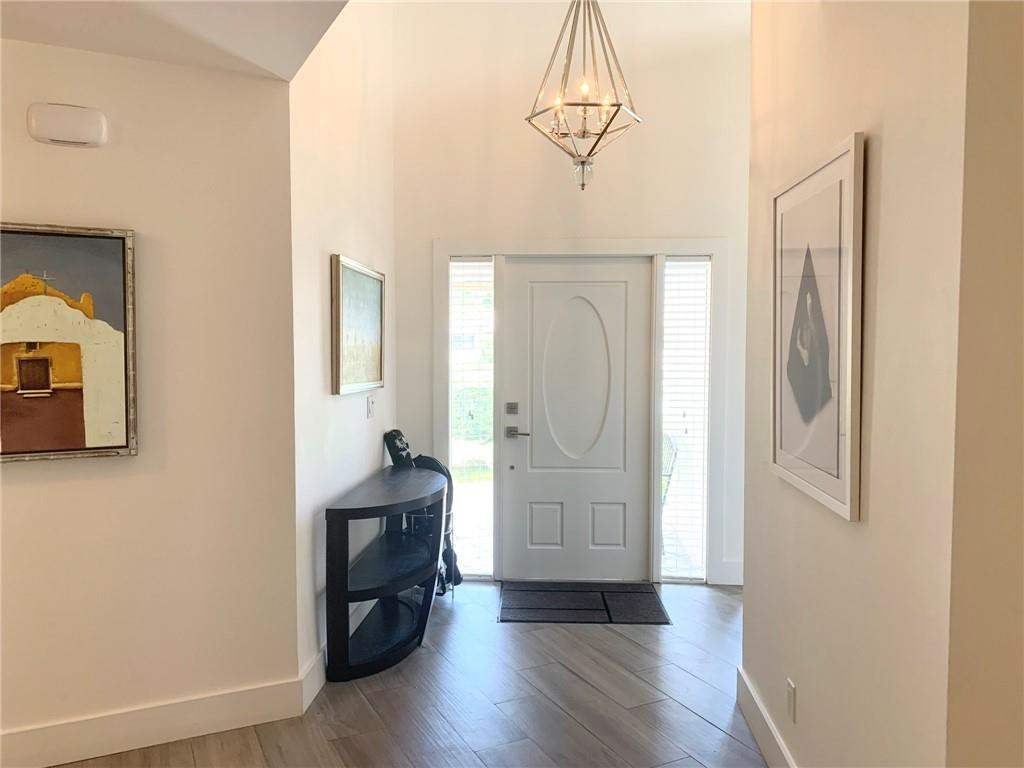 23336 Water Circle Boca Raton, FL 33486 - Photo 4 of 50 a view of livingroom with furniture and wooden floor