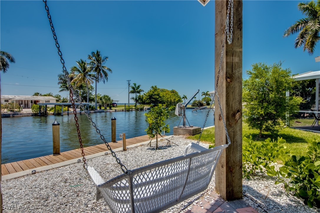 2579 Third Street Matlacha, FL 33993 - Photo 14 of 46 a view of a lake with a terrace