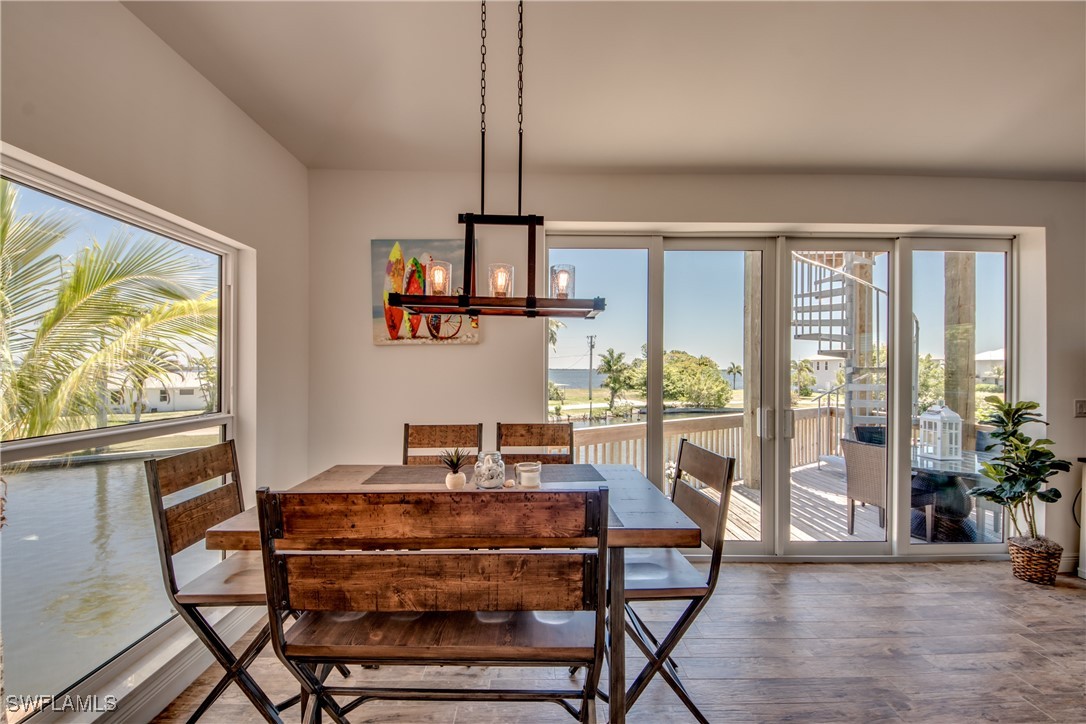 2579 Third Street Matlacha, FL 33993 - Photo 21 of 46 a view of a dining room with furniture window and outside view