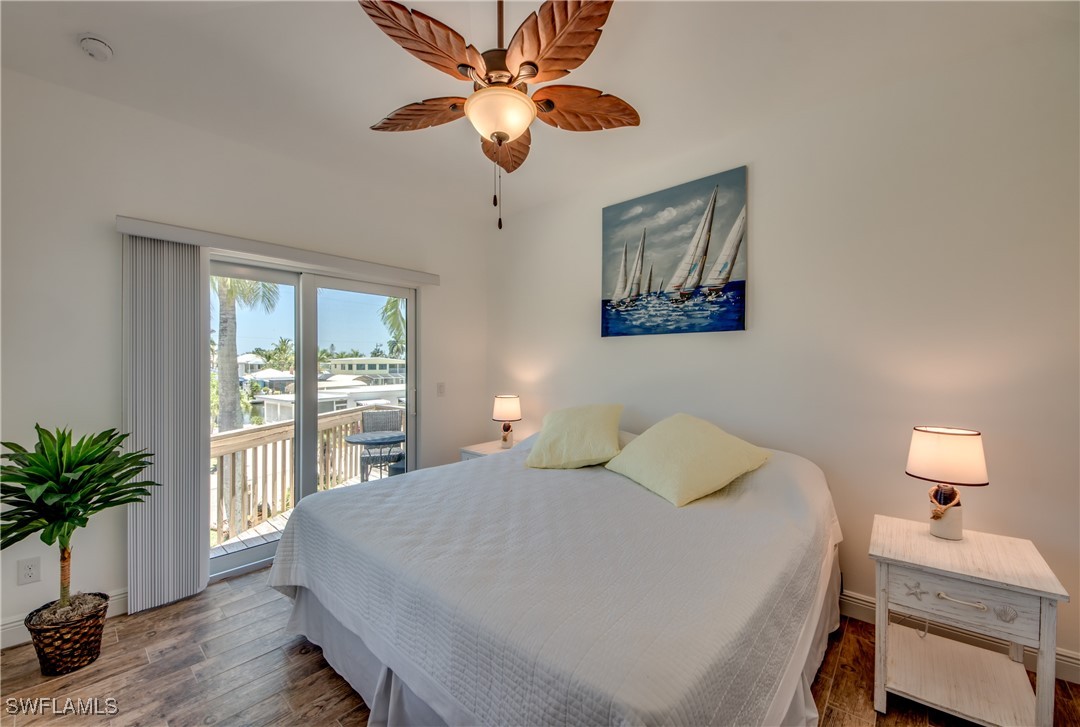 2579 Third Street Matlacha, FL 33993 - Photo 29 of 46 a bedroom with a bed and a window