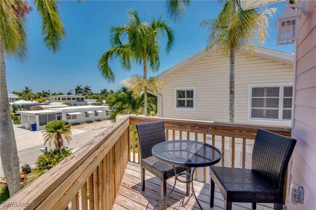 2579 Third Street Matlacha, FL 33993 - Photo 33 of 46 a view of a chairs and table in patio