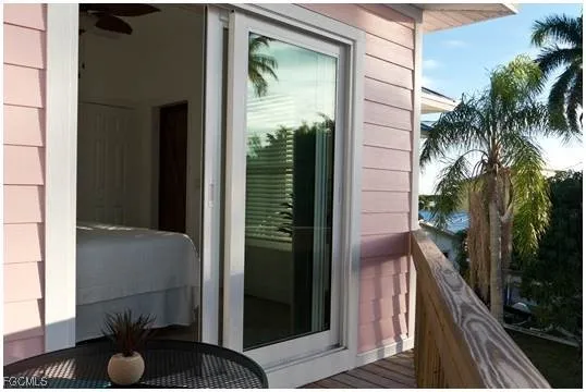 a view of balcony and a potted plant