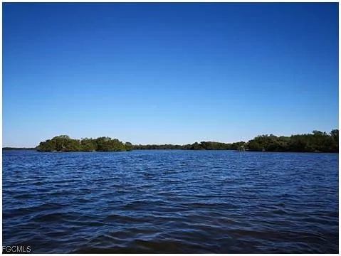 a view of lake and mountain