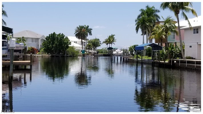 2579 Third Street Matlacha, FL 33993 - Photo 5 of 46 a lake view with palm trees