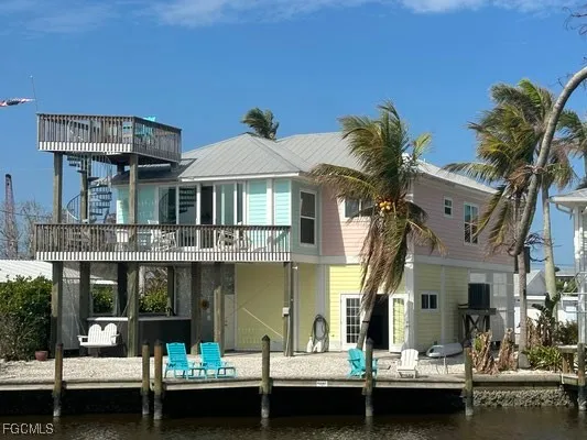 a front view of a house with swimming pool