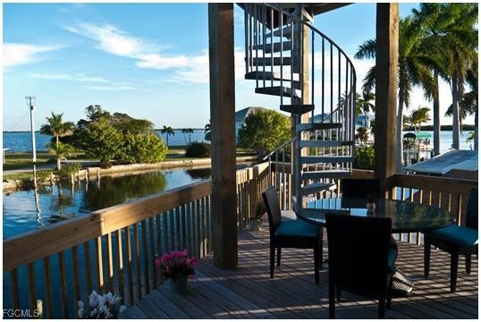 2579 Third Street Matlacha, FL 33993 - Photo 10 of 46 a view of a balcony with furniture