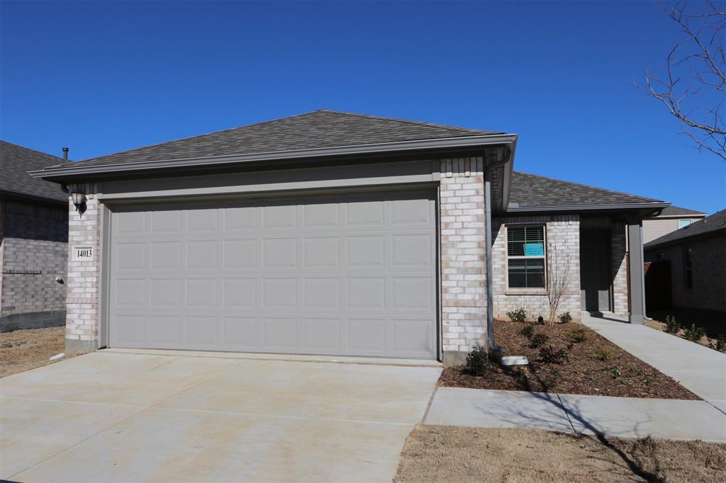 14013 Drover Street Pilot Point, TX 76258 - Photo 1 of 1 a front view of a house