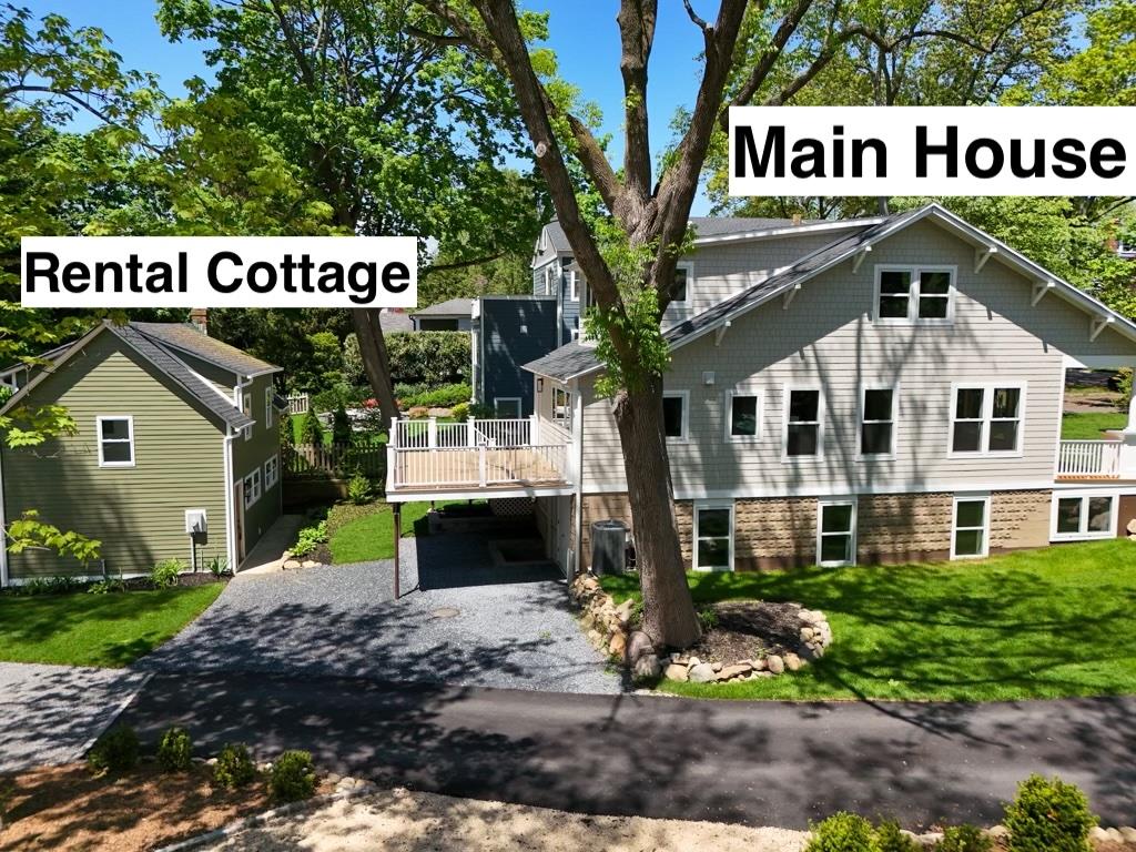 68 Glenlawn Avenue Sea Cliff, NY 11579 - Photo 3 of 49 a street sign on a pole on a street