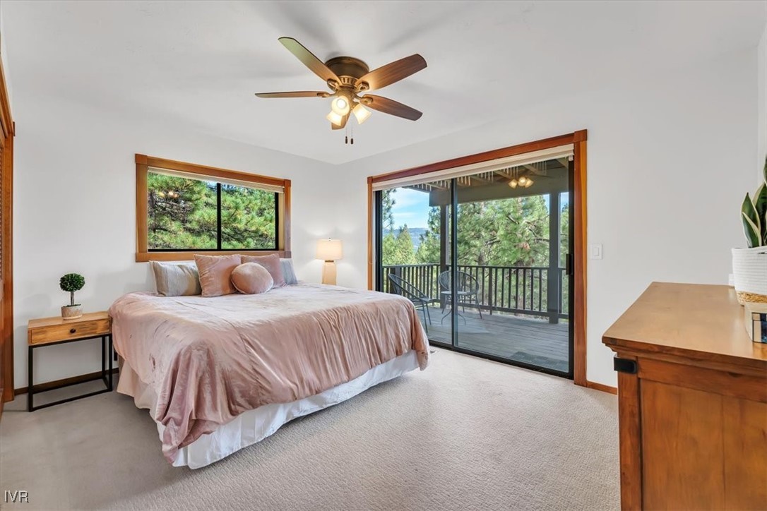 553 Silvertip Drive Incline Village, NV 89451 - Photo 20 of 35 a spacious bedroom with a bed and a window