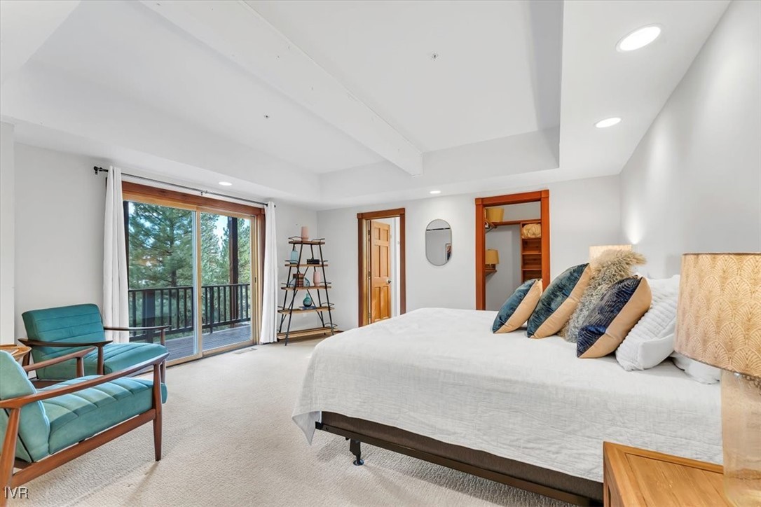 553 Silvertip Drive Incline Village, NV 89451 - Photo 24 of 35 a bedroom with a bed and glass walk in closet