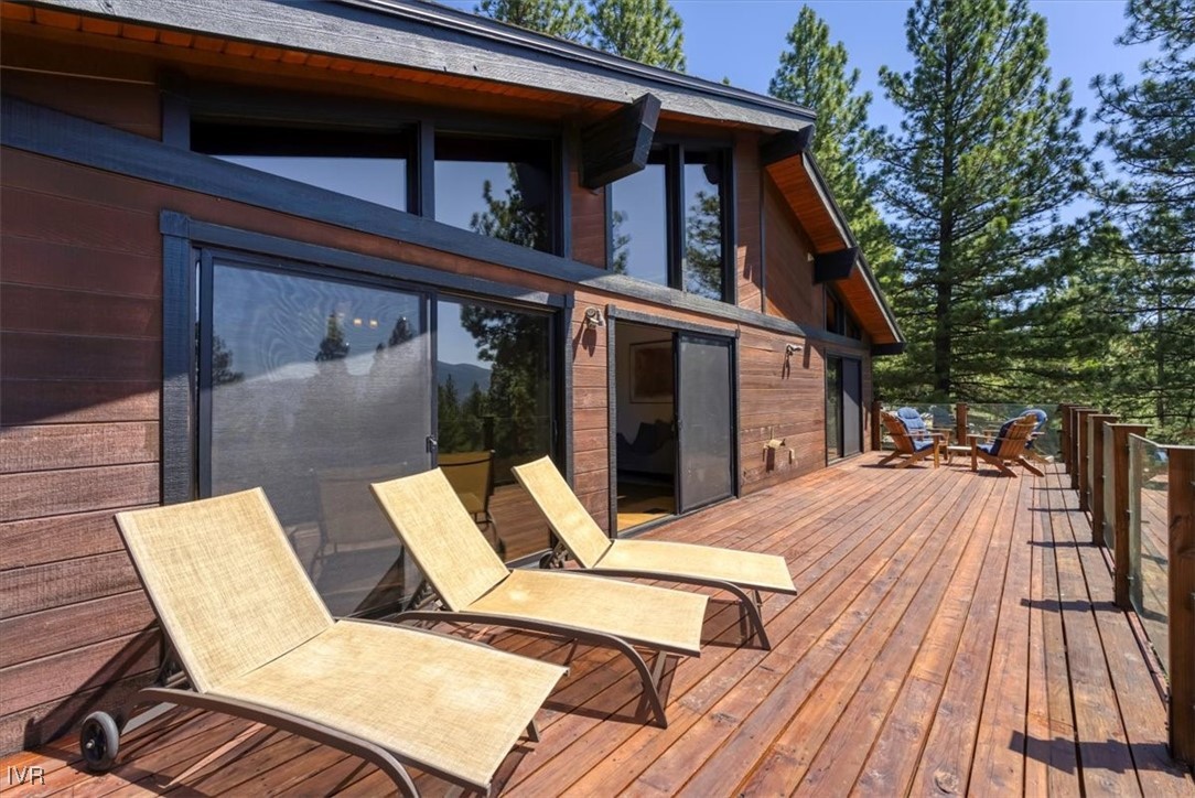 553 Silvertip Drive Incline Village, NV 89451 - Photo 4 of 35 a view of backyard with two chairs and wooden floor