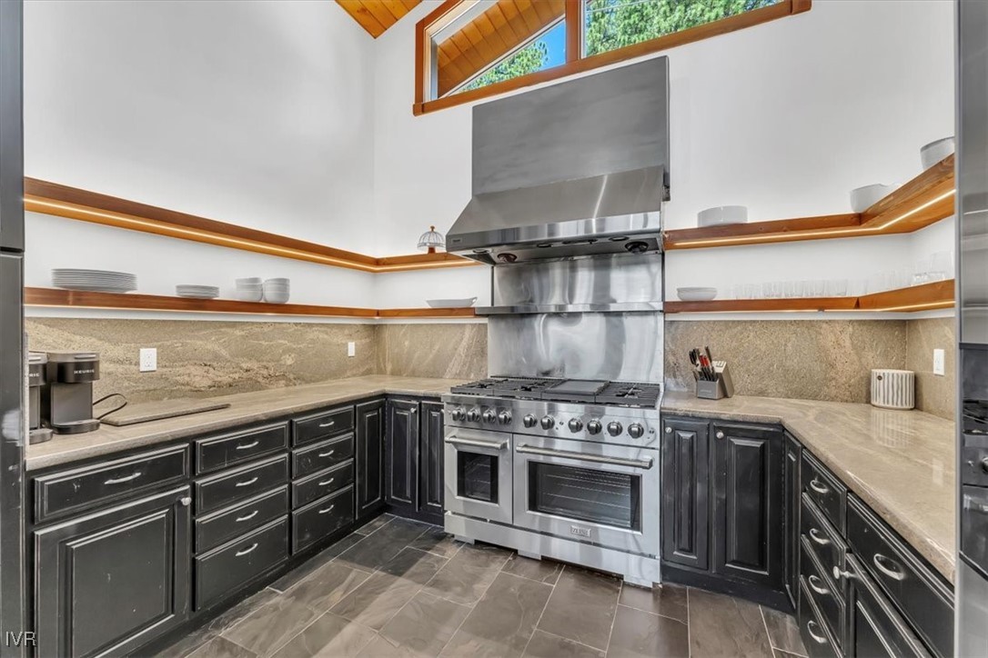 553 Silvertip Drive Incline Village, NV 89451 - Photo 10 of 35 a kitchen with a stove and a sink