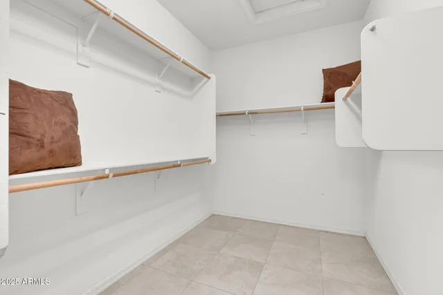 a view of a house with backyard and a tree