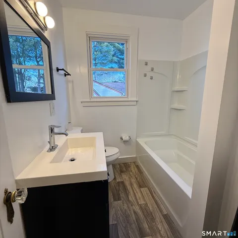 a bathroom with a sink and a bathtub