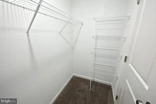 a view of small space with racks on the wall
