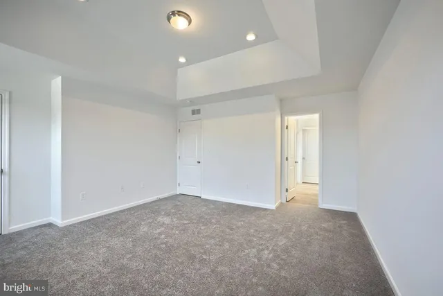 a view of small space with racks on the wall