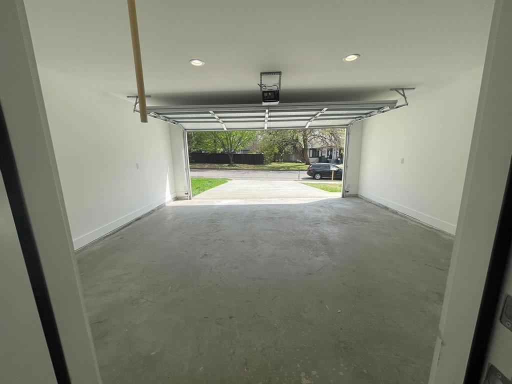 1315 West Gandy Street Denison, TX 75020 - Photo 17 of 19 a view of an empty room with a fireplace